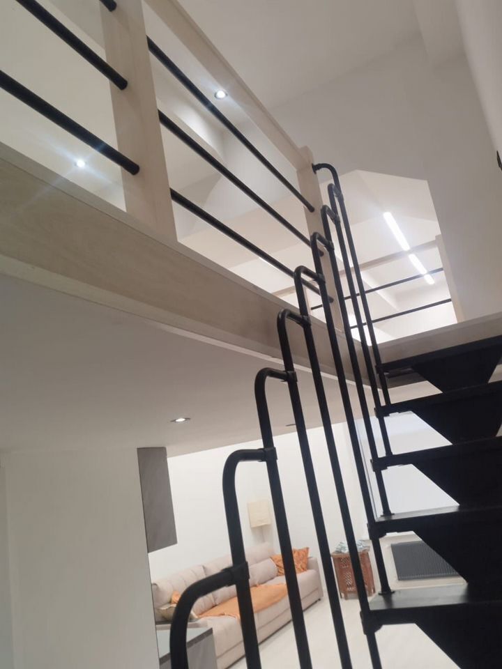 Двухуровневые апартаменты в уютном переулке