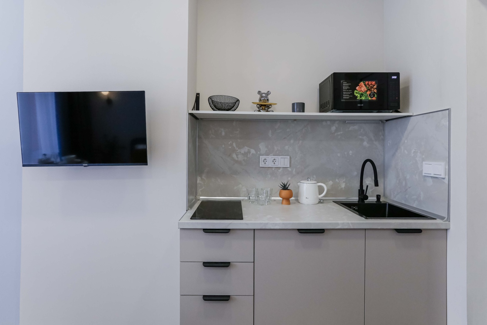 Уютная студия на Новоостаповской