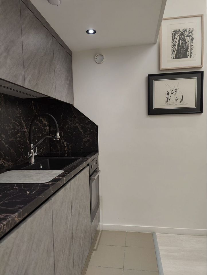 Двухуровневые апартаменты в уютном переулке