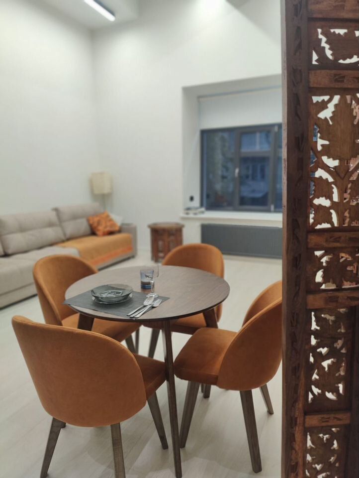 Двухуровневые апартаменты в уютном переулке