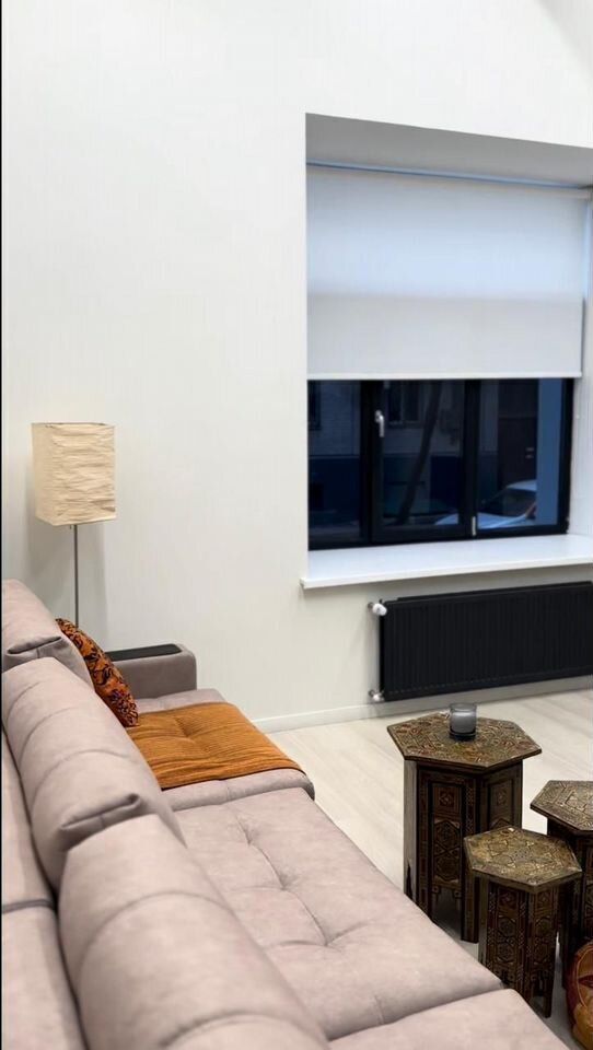 Двухуровневые апартаменты в уютном переулке