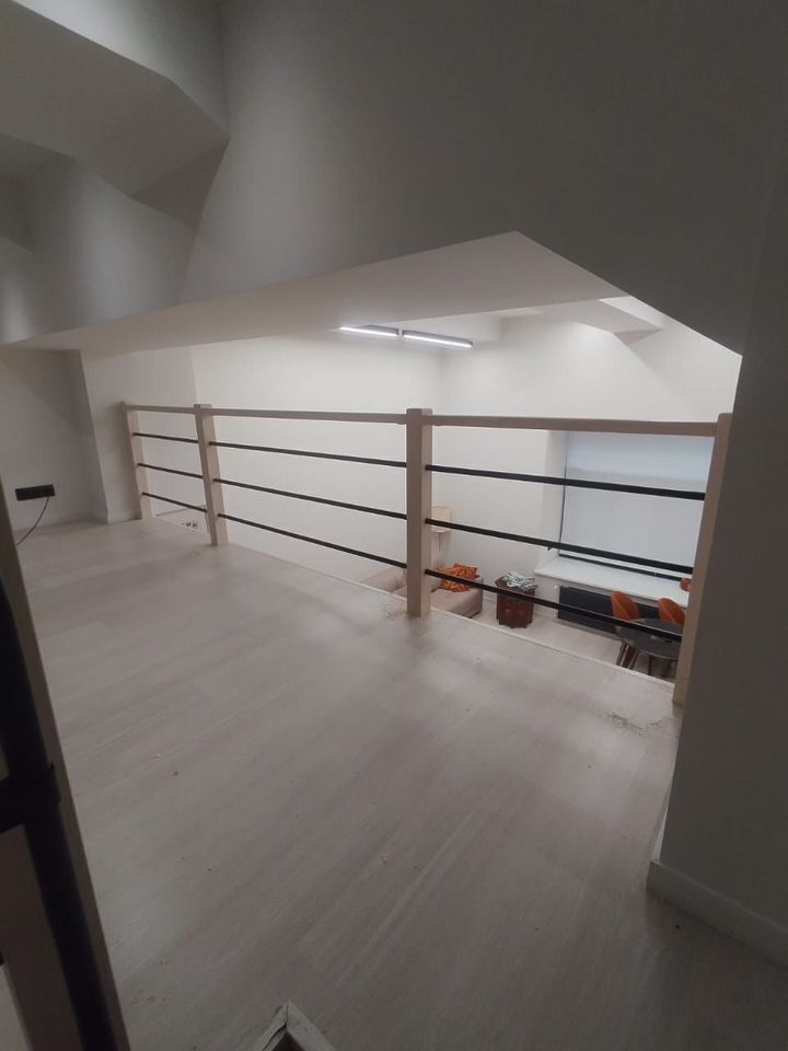 Двухуровневые апартаменты в уютном переулке