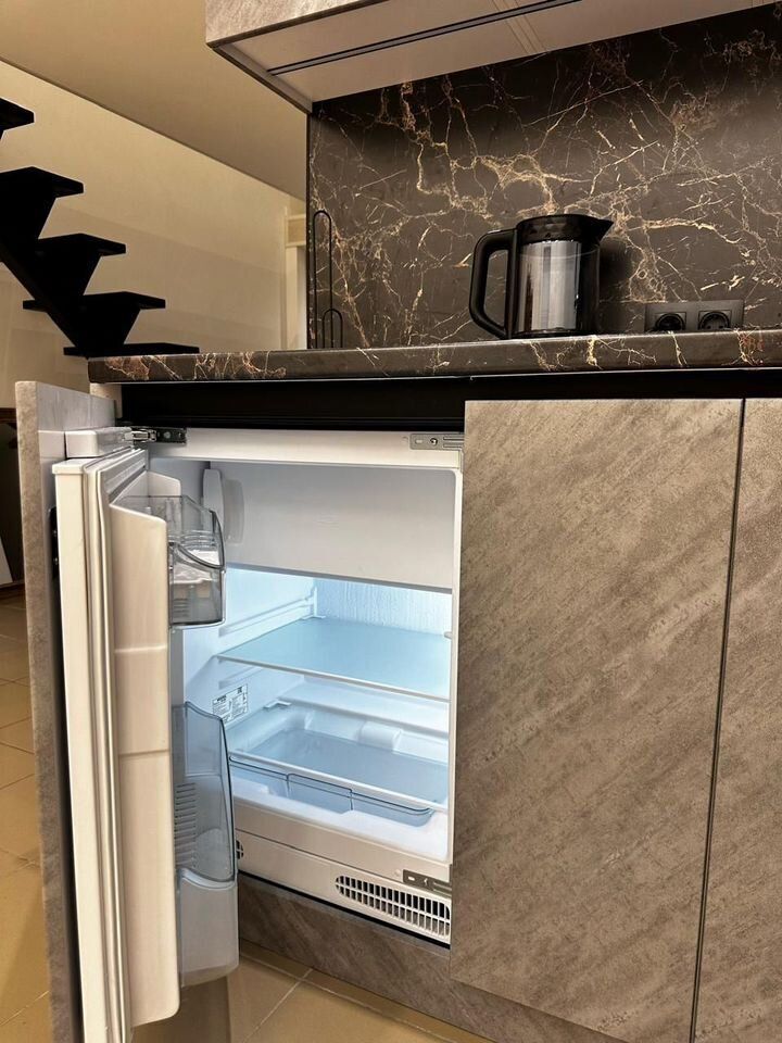 Двухуровневые апартаменты в уютном переулке