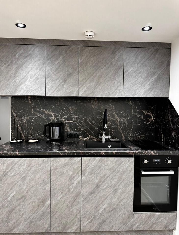 Двухуровневые апартаменты в уютном переулке